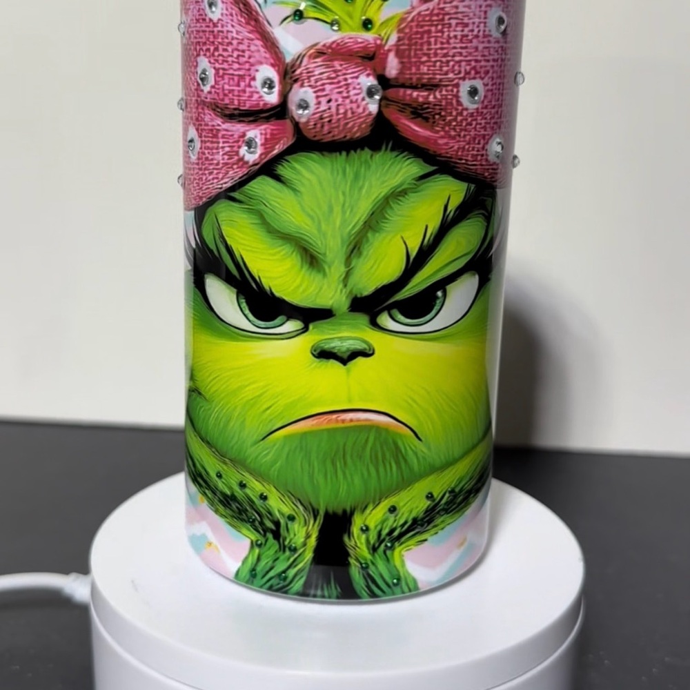 Vibrant Tumbler with Green Character and Pink Bow